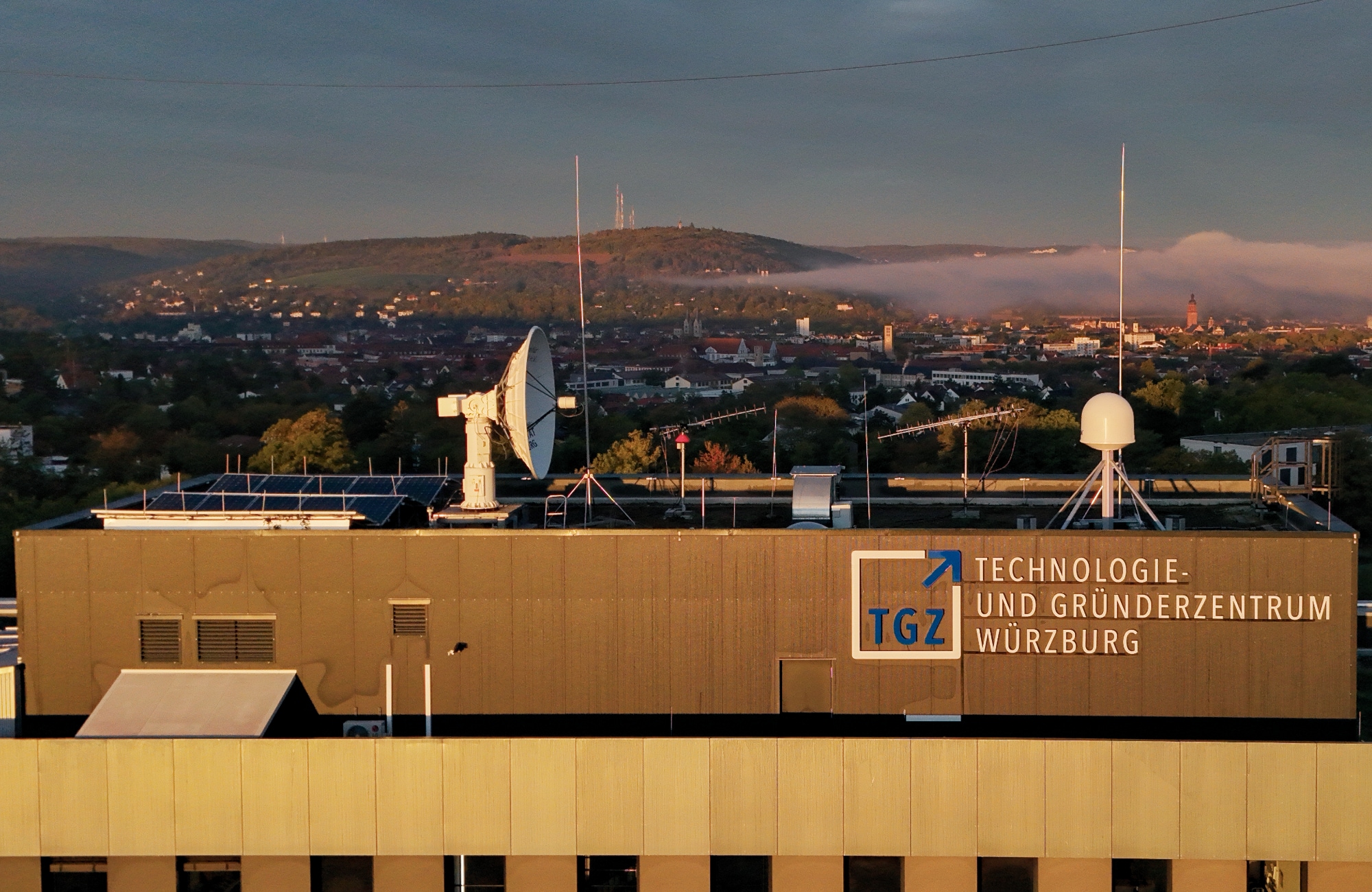 Upgrading a 3-meter S/X-band antenna with GS-400II at Zentrum für Telematik e.V., Germany: the antenna on the rooftop of the building in Würzburg